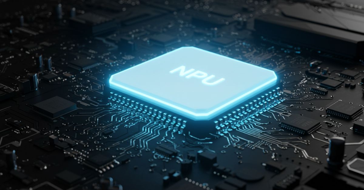 マザーボードに埋め込まれたNPUチップが青白く光っている未来的なイメージ